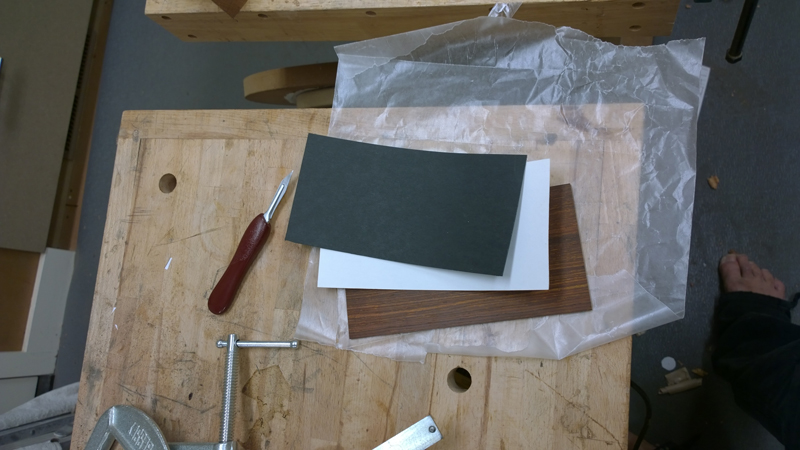 Headstock veneer stack — cocobolo / fiber / cocobolo