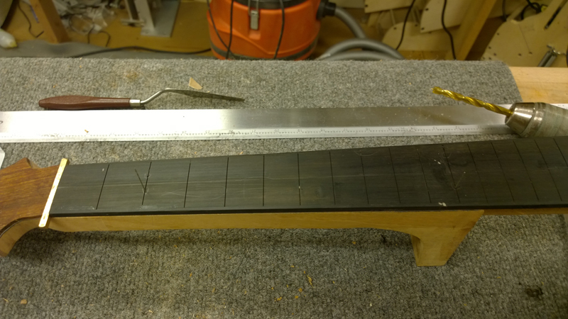 Fretboard glued on — caul pressing edges