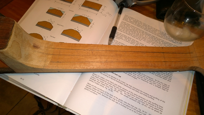 Neck carved — starting to look like a guitar