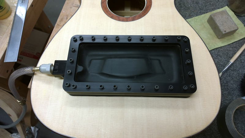 Bridge glued with vacuum clamp