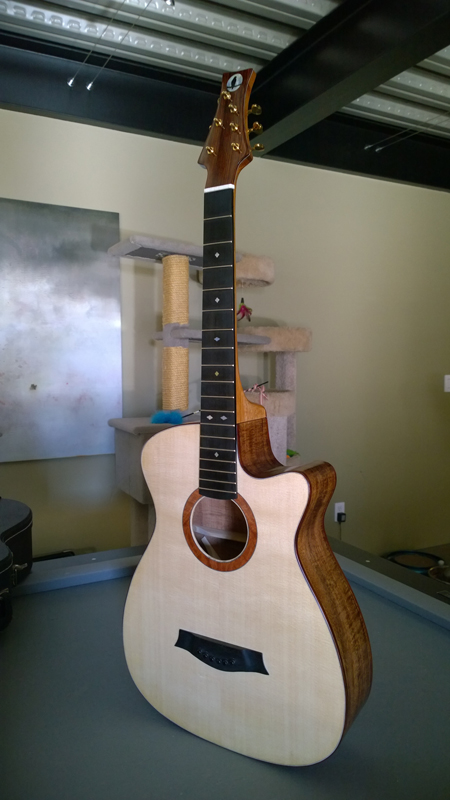 Guitar strung up — almost there